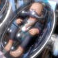 Baby In Capsule